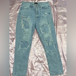 Baggy worn out jeans light blue size 9 but fits a 8